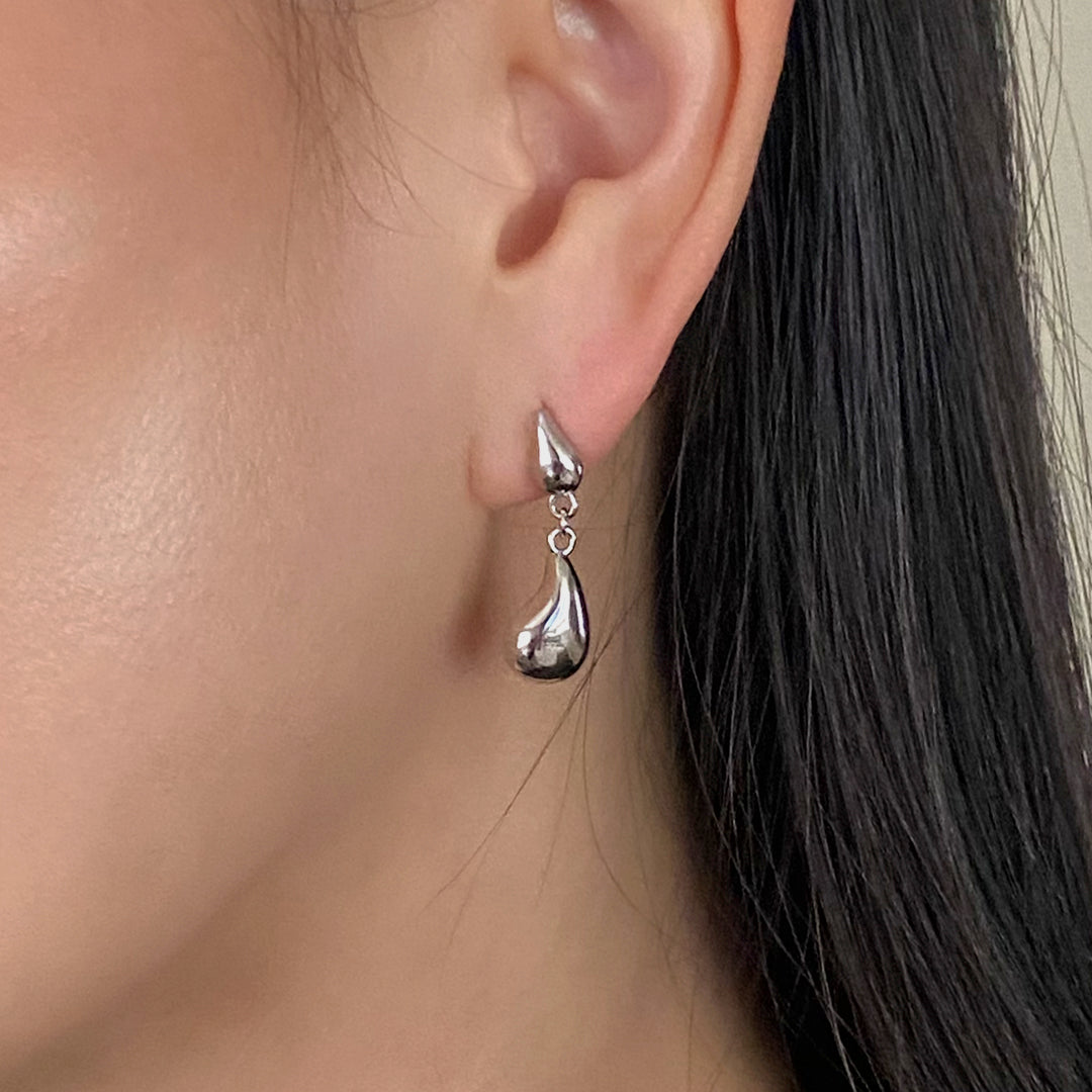 Female model wearing Droplet Earrings