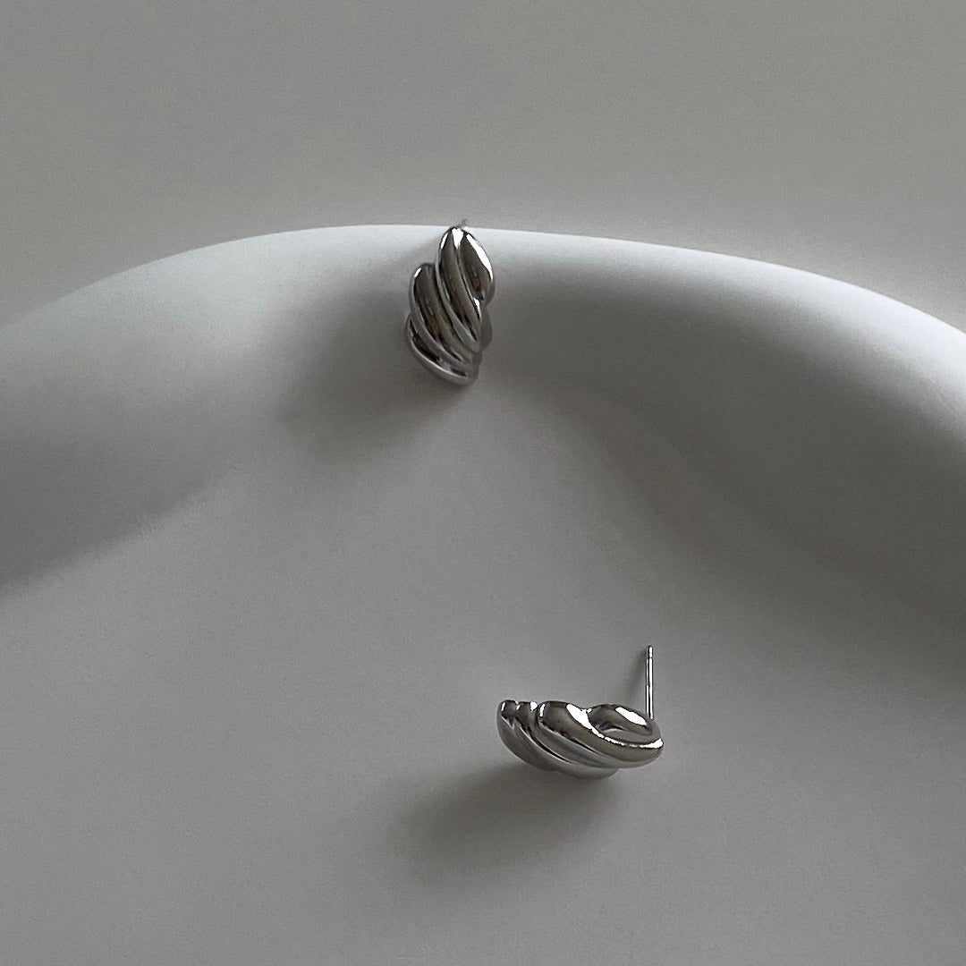 CHESI 925 sterling silver Croissant Studs showing front and side view. 