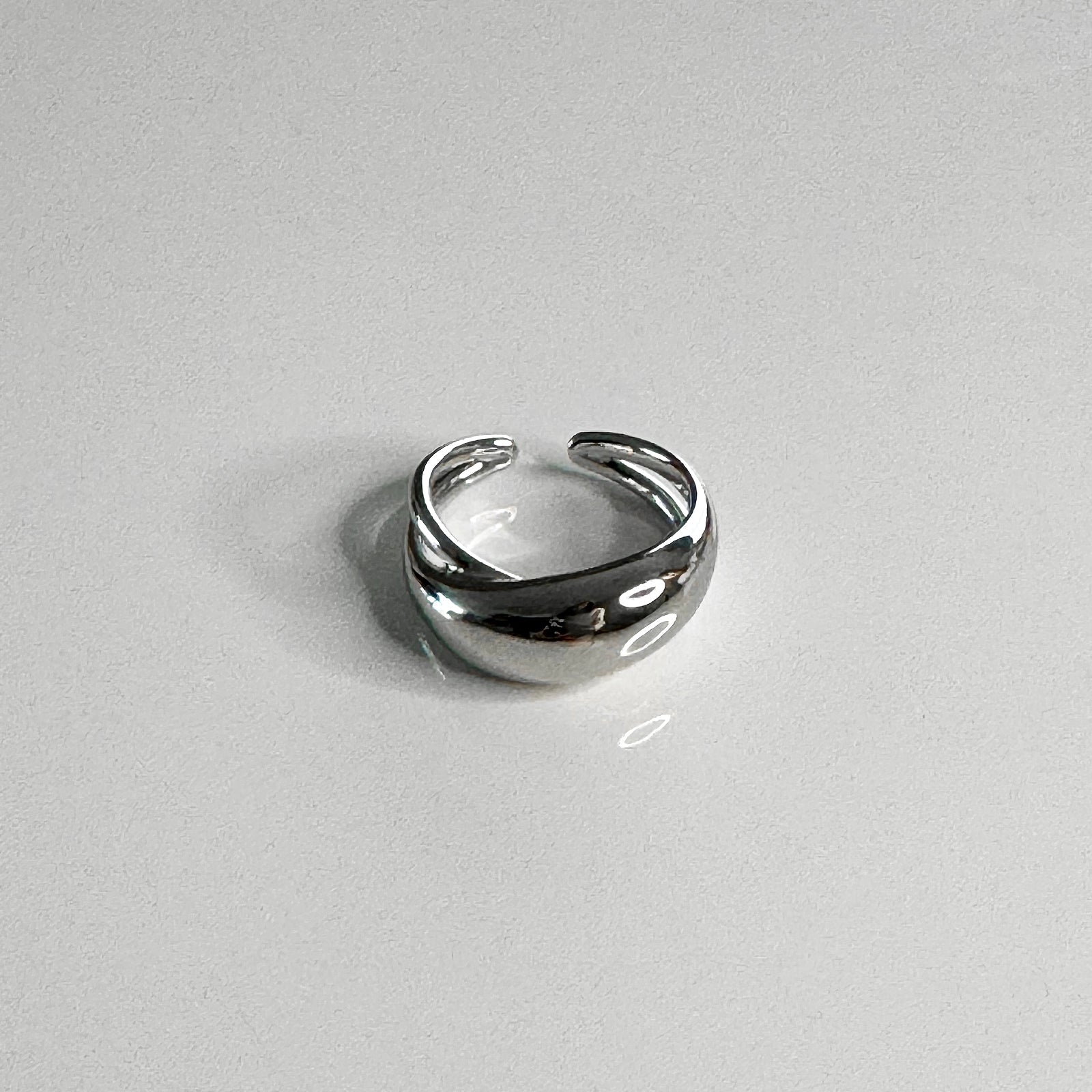 Front view of CHESI 925 sterling silver Dome Cut Out Ring with rhodium plating.
