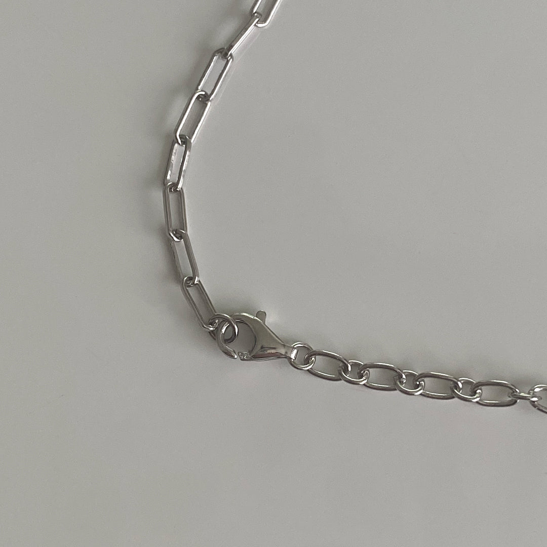 CHESI 925 sterling silver Half and Half Pendant Necklace with rhodium plating showing closure details. 
