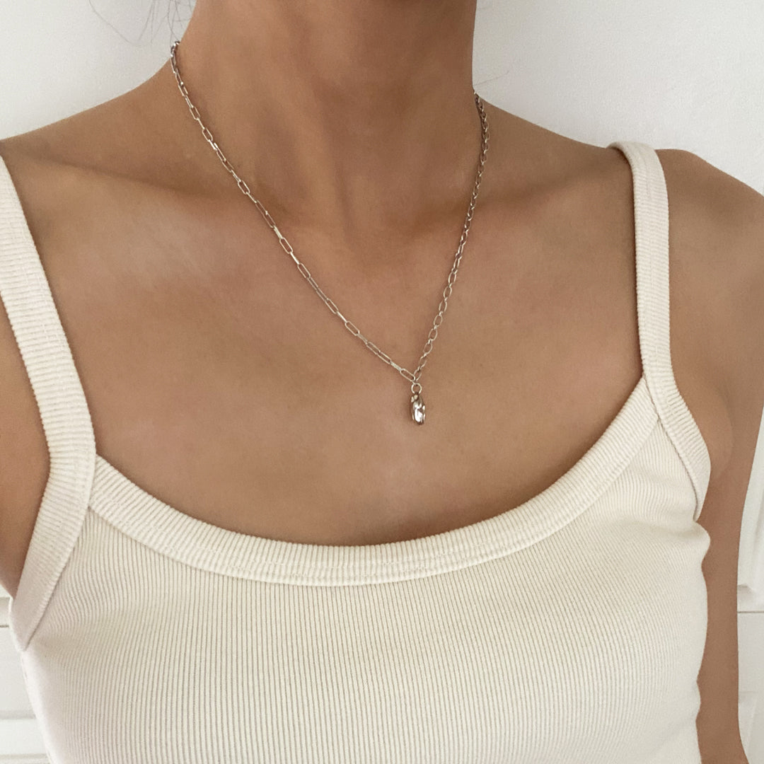 CHESI 925 sterling silver Half and Half Pendant Necklace with rhodium plating worn by model.