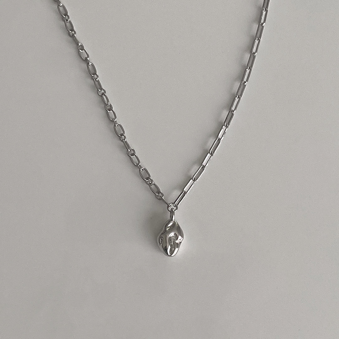 Front detail view of CHESI 925 sterling silver Half and Half Pendant Necklace with rhodium plating showing chain and pendant details.