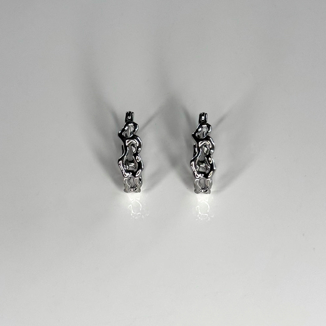 Side detail view of CHESI 925 sterling silver Irregular Chain Hoops with rhodium plating.