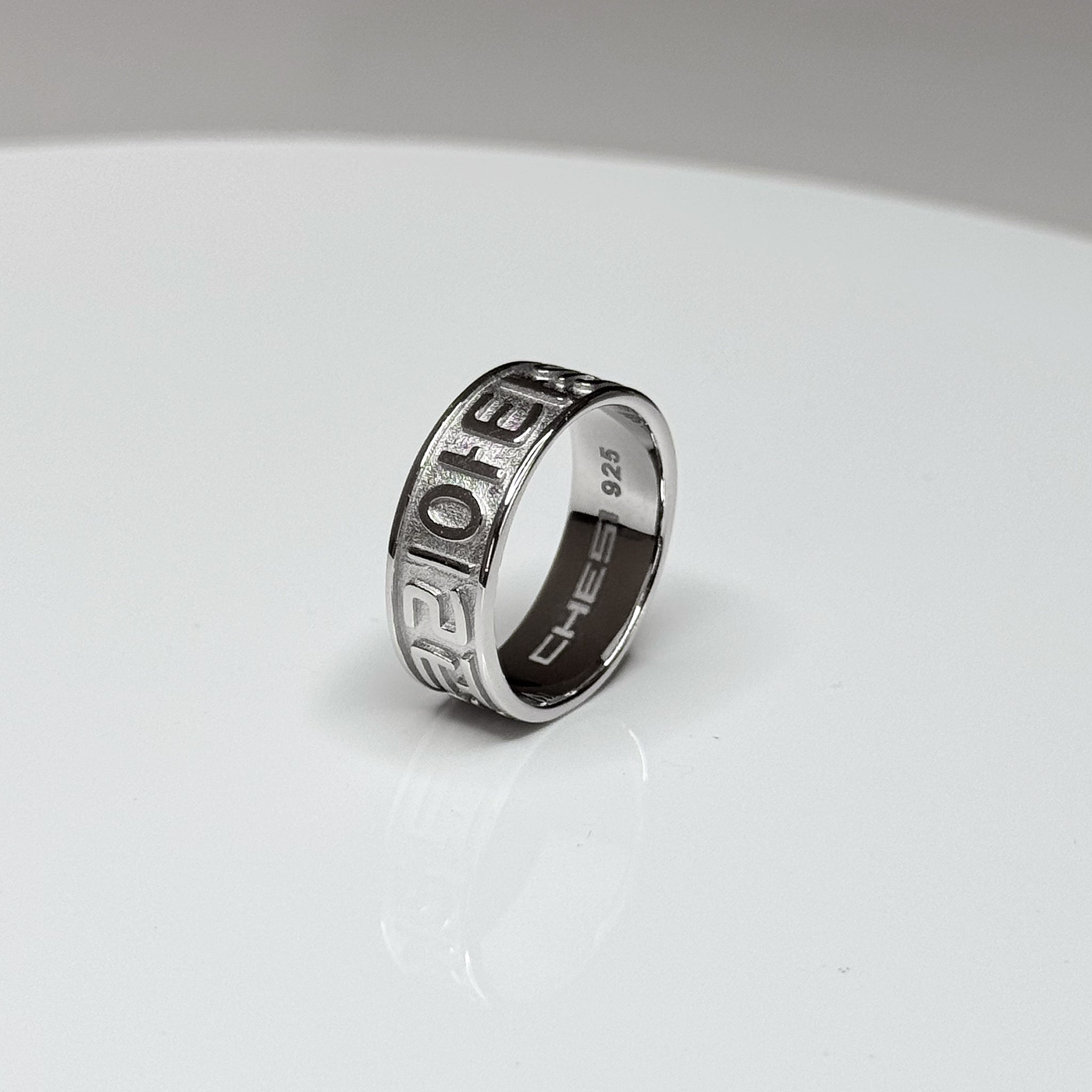 Side and inside view of CHESI 925 sterling silver Koreatown ring showing logo and 925 stamp.