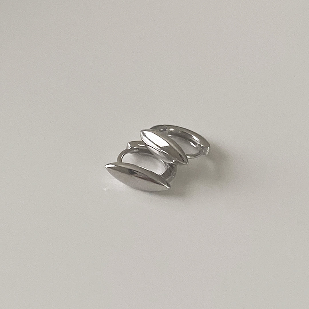 Front stacked view of CHESI 925 sterling silver Pointed Mini Huggies with rhodium plating.
