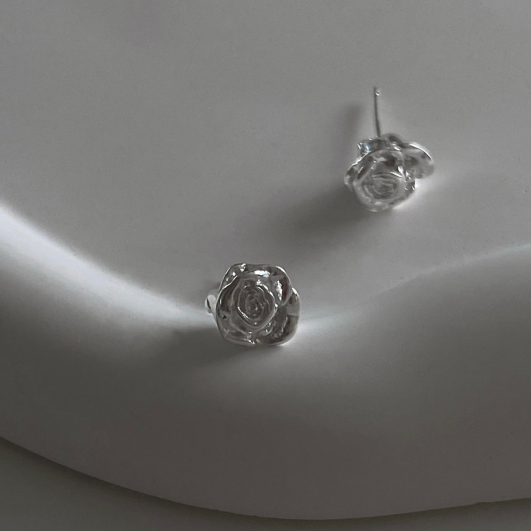 Close-up detail view of CHESI 925 sterling silver Rosy Studs.