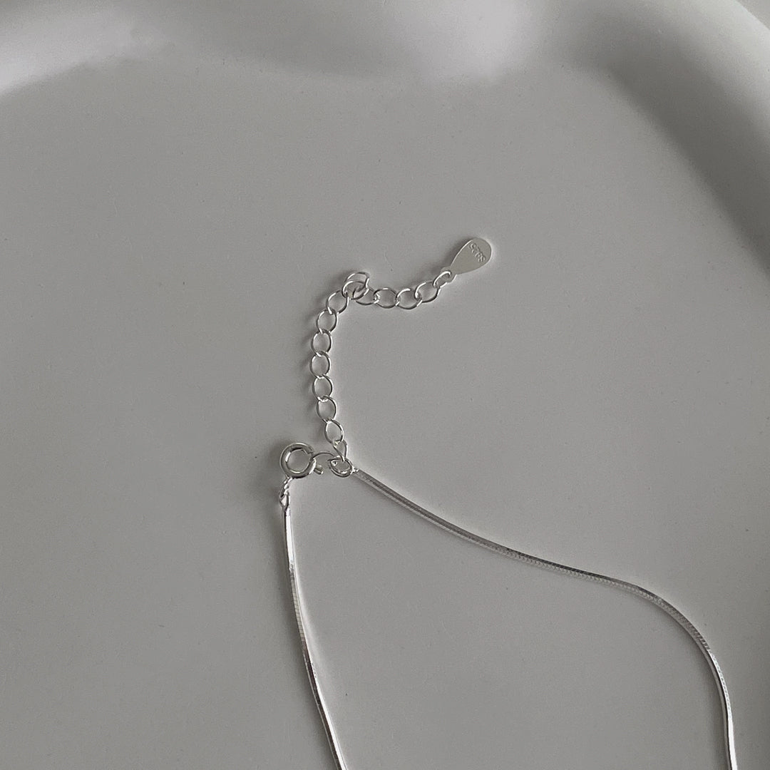 CHESI Triple Charm Necklace in 925 sterling silver, close-up of adjustable chain closure detail.