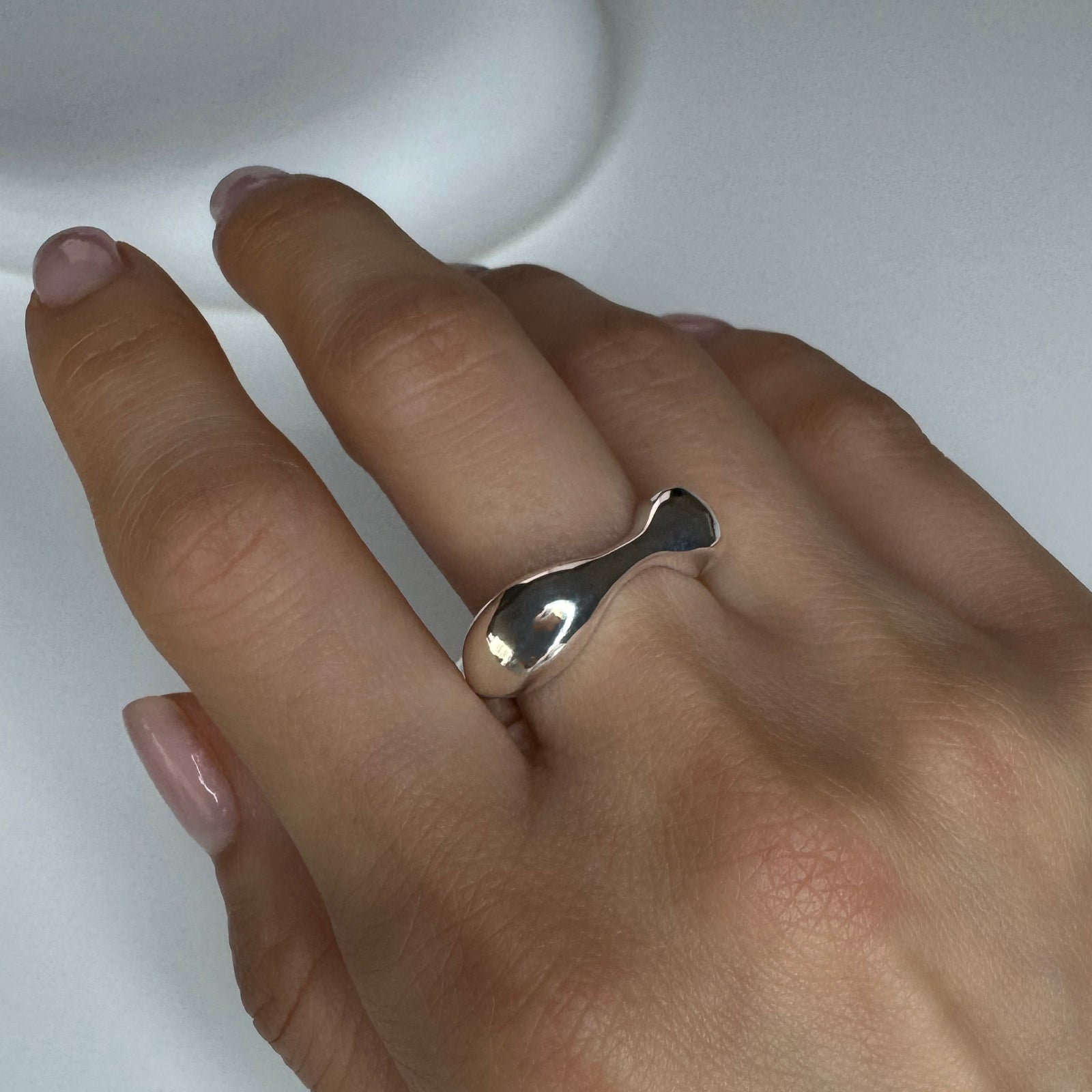Top view on hand of square bubble ring. Made with genuine 925 sterling silver