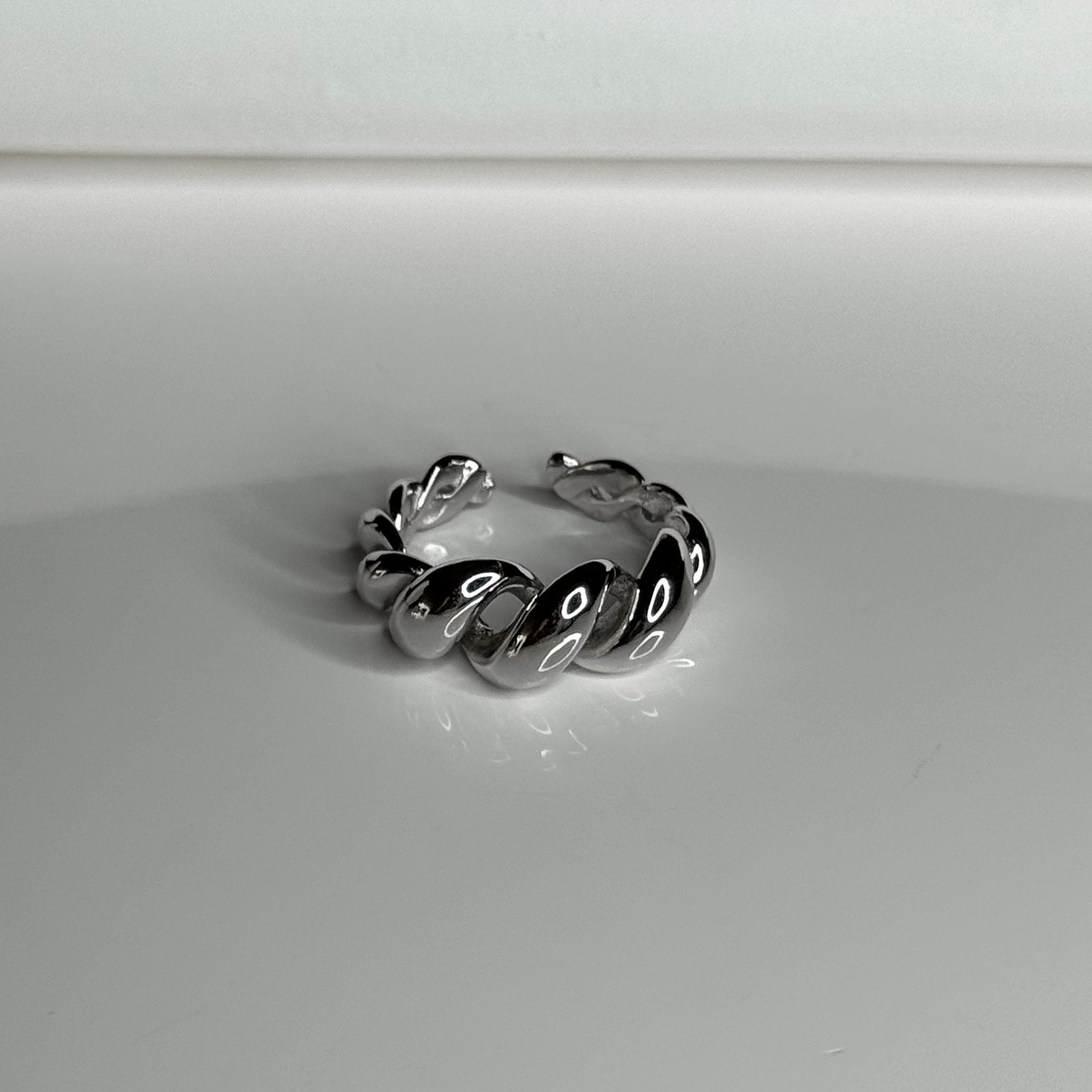Front view of Twisted Ring. Adjustable ring
